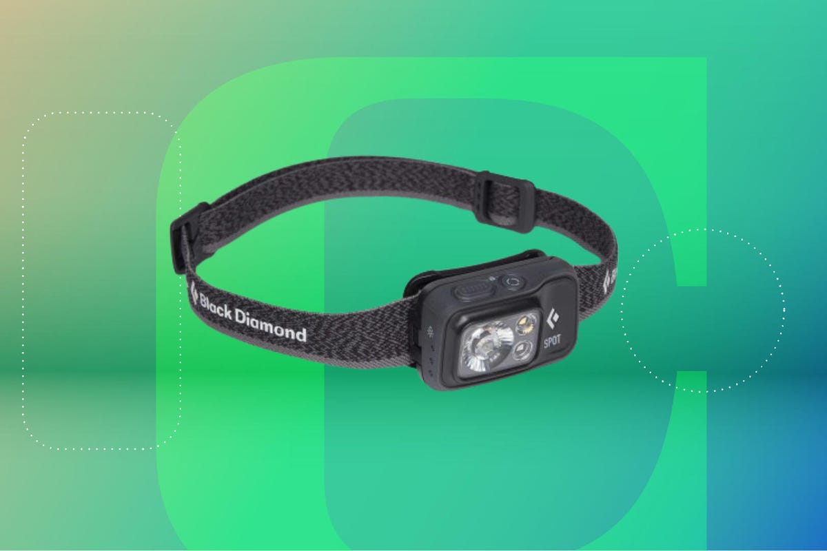 A Black Diamond headlamp against a green CNET background.